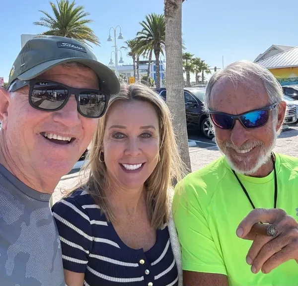 Michael Magic Morgan with two friends in LA caps