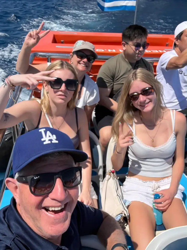 Magic with new friends on a boat in Santorini