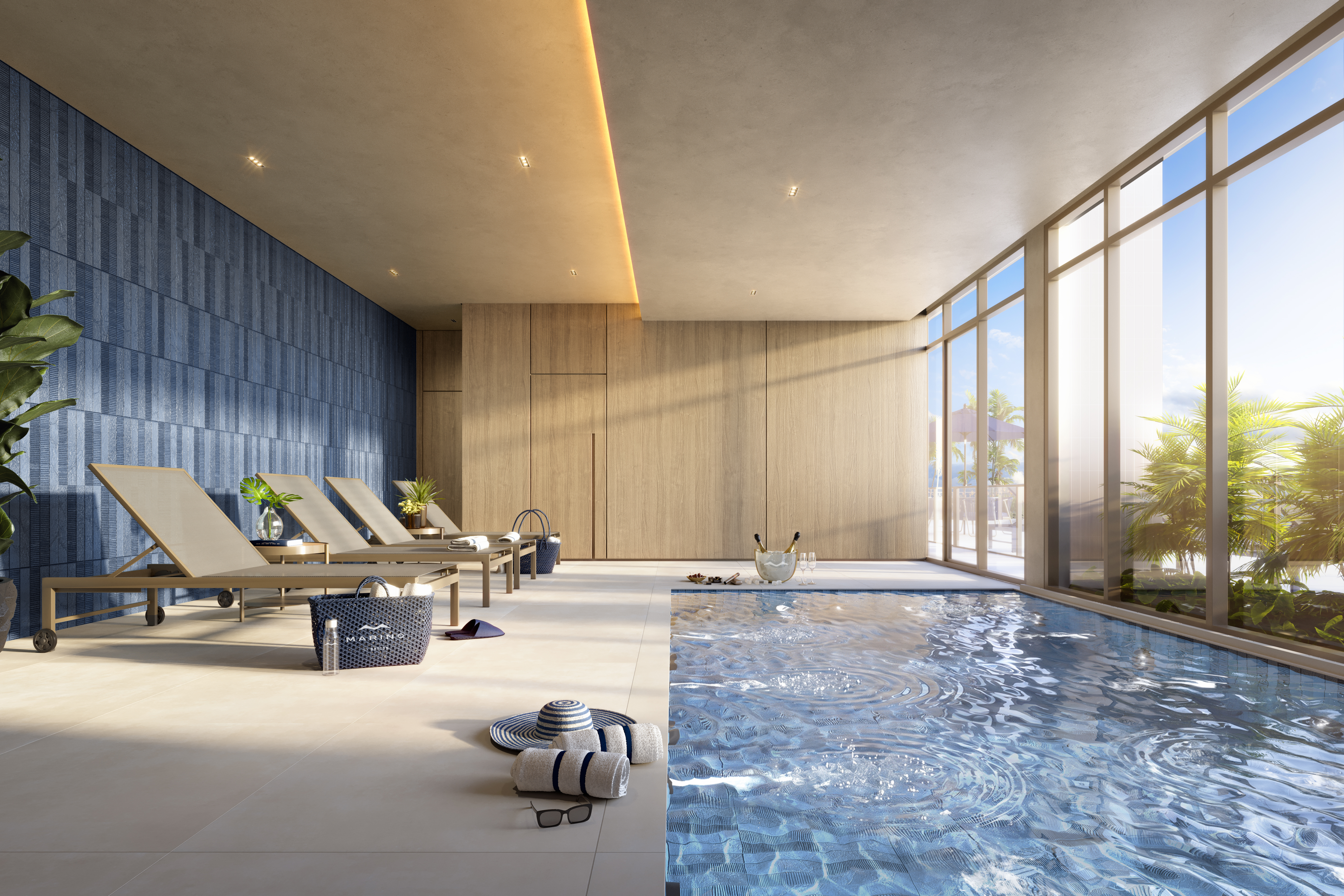 Área de lazer com piscina interna e espreguiçadeiras
