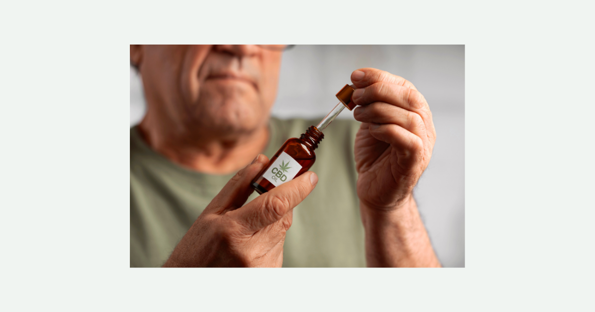 Pessoa utilizando óleo de CBD